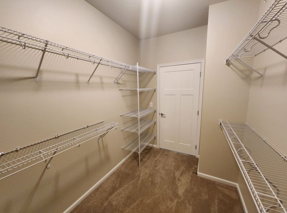 View of Master Bedroom Walk In Closet